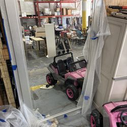 A Pair Of Standing Mirrors