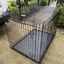 XL 43x28x28” Collapsable Dog Crate in great shape.  Double locks and double doors!