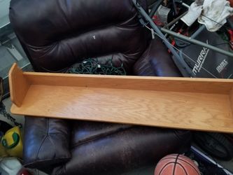 Long wooden livingroom shelf