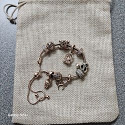 PANDORA ROSE GOLD CHARM BRACLET