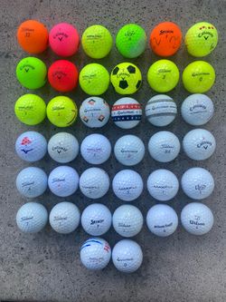38 used golf balls