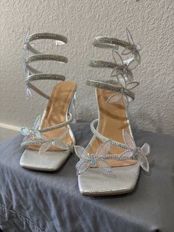 Silver butterfly heels
