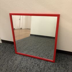 RED FRAMED WALL MIRROR