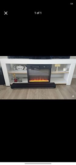 White TV console with electric fireplace