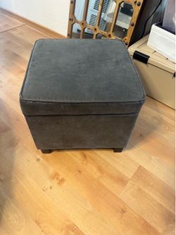 Gray storage ottoman