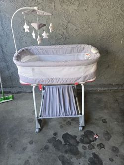 Baby Bassinet with Mobile and Storage