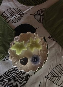 Few little candles and holder