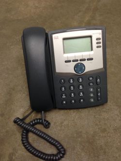Black and Silver Cisco IP Phone Desk
