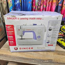 Singer 3232 sewing machine appears new in box