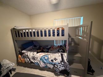 Twin bunk beds with trundle and stairs