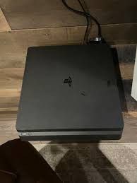 PS4 Slim With Wires An Aftermarket Remote Works Great