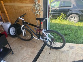 Genesis Full Suspension Mountain Bike and a Mongoose Ledge 2.1 Bike