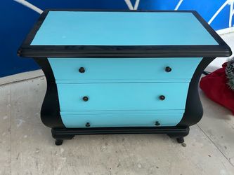 Turquoise and black bombe chest