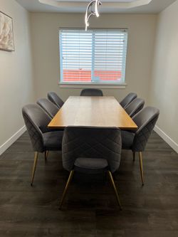 Natural wood table with 8 chairs