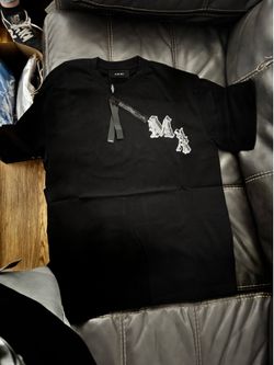 (Item is not free) all black with white Amari shirt