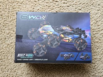 New And Sealed 6WD Drift Stunt, Remote Control Car for Boys Age 6-12, 360° Rotating Spray Car for Xmas Gifts