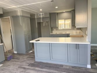 Custom kitchen cabinets, bathroom remodel. Granite. And more.