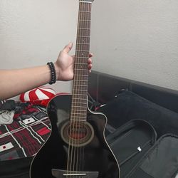 Guitarra  Pequeña Yamaha .