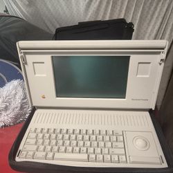 vintage Apple Macintosh Portable computer, produced between 1989 and 1991. 

