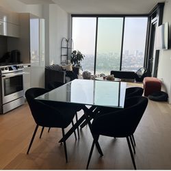 Glass dining table + 4 chairs