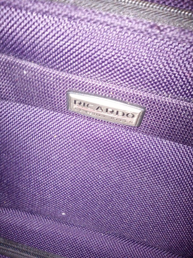 Purple Used Suit Case