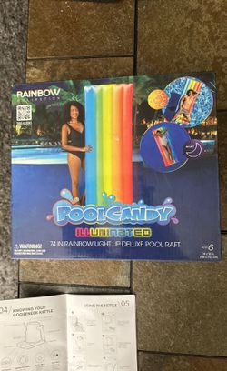 A Floating Raft For The Pool That Lights Up With Color Changing Waterproof Led Lights At Night.