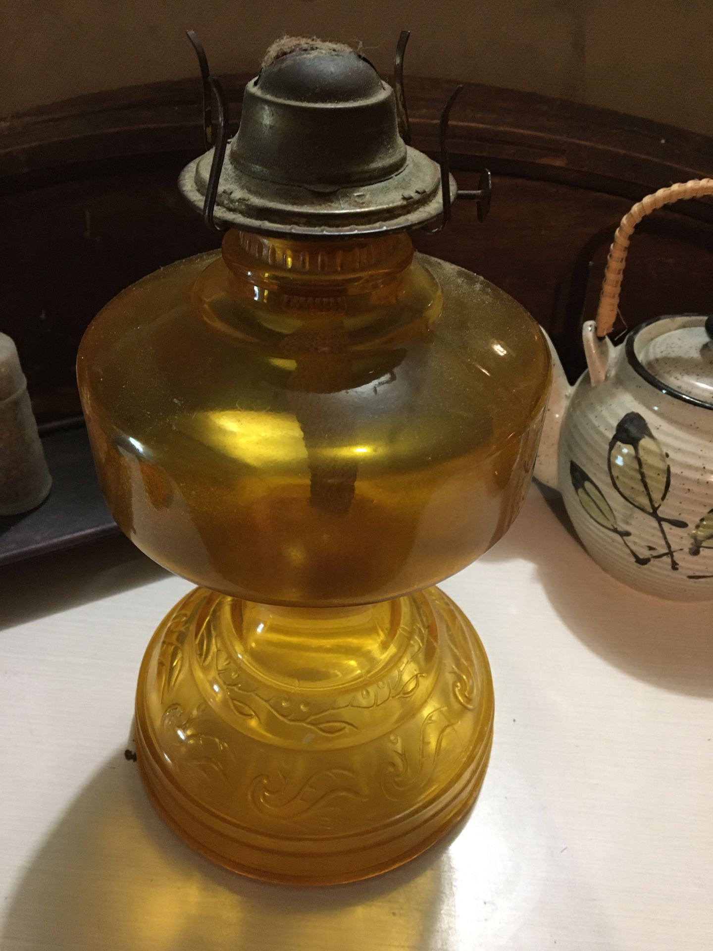 Antique amber oil lamp