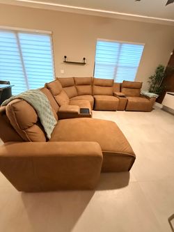 Sectional couch with electric recliners