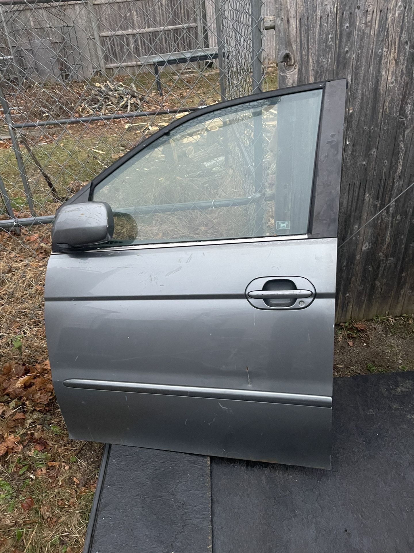 2002 Honda Odyssey Drivers Door, Fender, Bumper Support Brace, Head Light, And Grille 