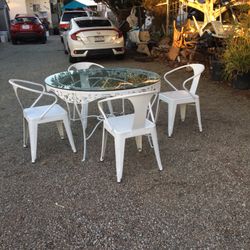 Nice  Metal Chairs  And Metal  Tables  With  Glass Top 