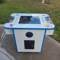 Cocktail arcade game with 50 games built-in and takes quarters