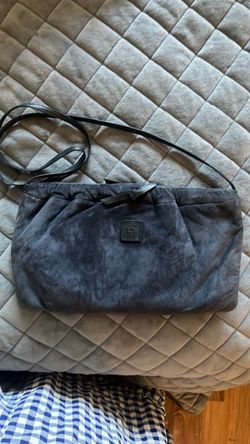 Large suade Anne Klein Clutch w strap.