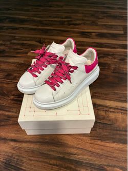 White Alexander McQueen with pink laces