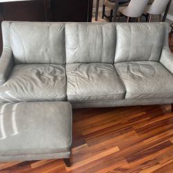 Leather couch and Ottoman 