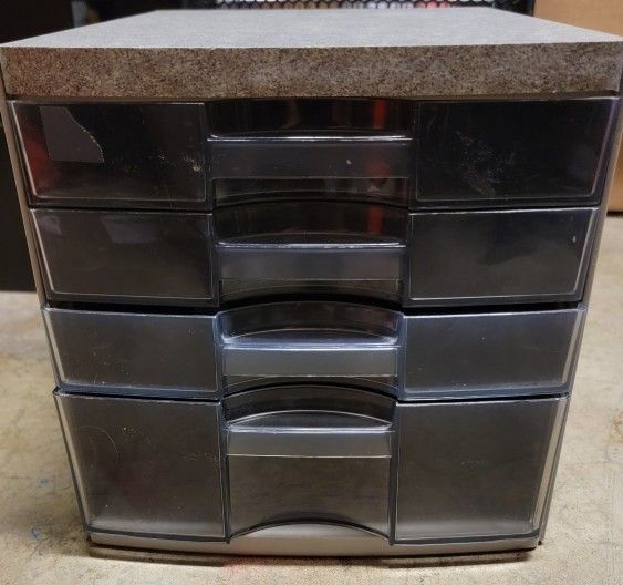 Gray storage organizer with drawers