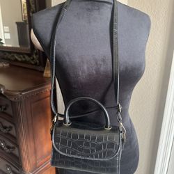 Black crocodile print handbag with gold hardware #luxury #crocodileprint  The measurements are  7”x5”x3” In excellent condition  It’s can be wear many