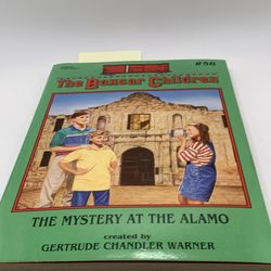 The Boxcar Children No. 58 The Mystery at the Alamo, book hole in page