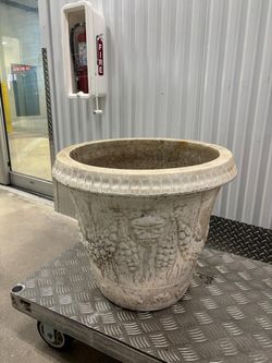 Solid concrete large planting pot … with hole in the bottom..  22” around , 20 “ high  $60