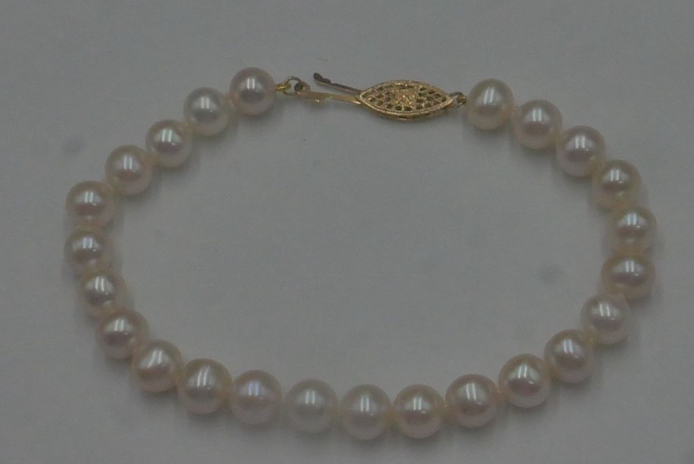 14kt clasp 7.5mm pearl bracelet 13.1 grams 886378-13