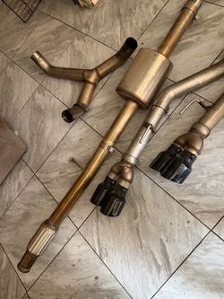 2019-2026 Silverado/Sierra 1500 5.3L AWE OFG Cat-Back Exhaust Quad Black Tips