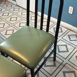 12Green cushioned chairs 15 dollers each