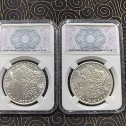 2 Morgan silver dollars (1879CC-1880CC)