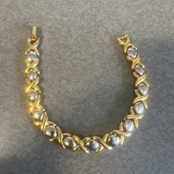 Woman’s Gold And Silver Bracelet 7” Long 