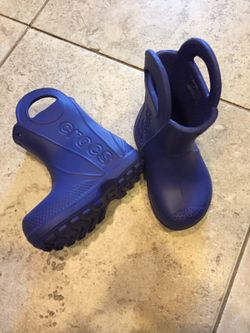 Crocs rain boots, size 6