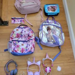 girl 4 bags .. 3 headphones .. 2 lunchboxes and 2 cups and 1 purse all $22