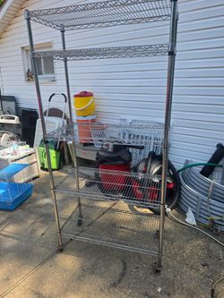 Price is firm.. steel wire mesh shopping unit on caster wheels