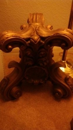 2 pillars with one coffee size glass top