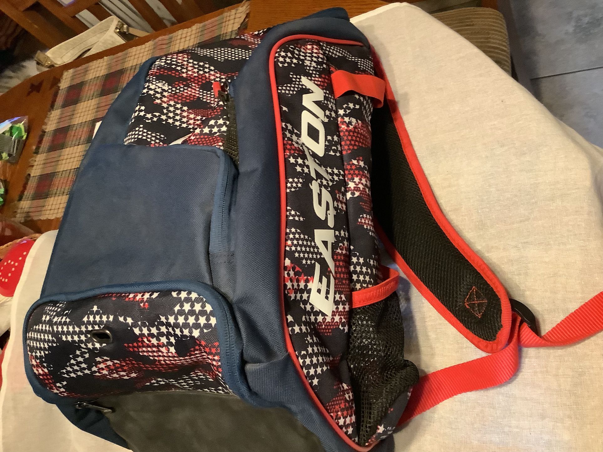 Easton Game Ready bat bag. This is the Stars and Stripes edition. All zippers work dual bat storage, room for helmet, spikes and gloves. Multiple sto