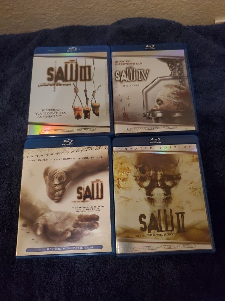 SAW BLU-RAYS 4 MOVIES COLLECTION