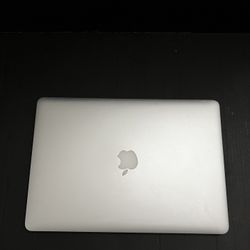 2015 Macbook 499 GB 15 inch 